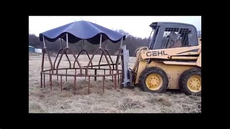 skid steer moving hay|round hay bale movers.